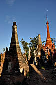 Inle Lake Myanmar. Indein, on the summit of a hill the  Shwe Inn Thein Paya a cluster of hundreds of ancient stupas. Many of them are ruined and overgrown with bushes.